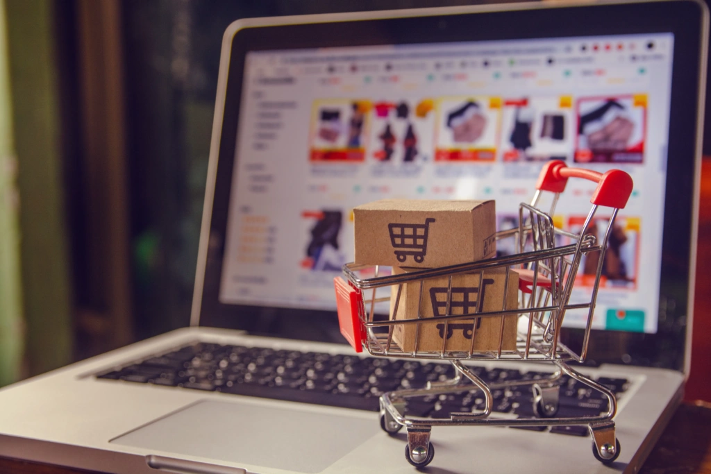 parcel-paper-cartons-with-shopping-cart-logo-trolley-laptop-keyboard